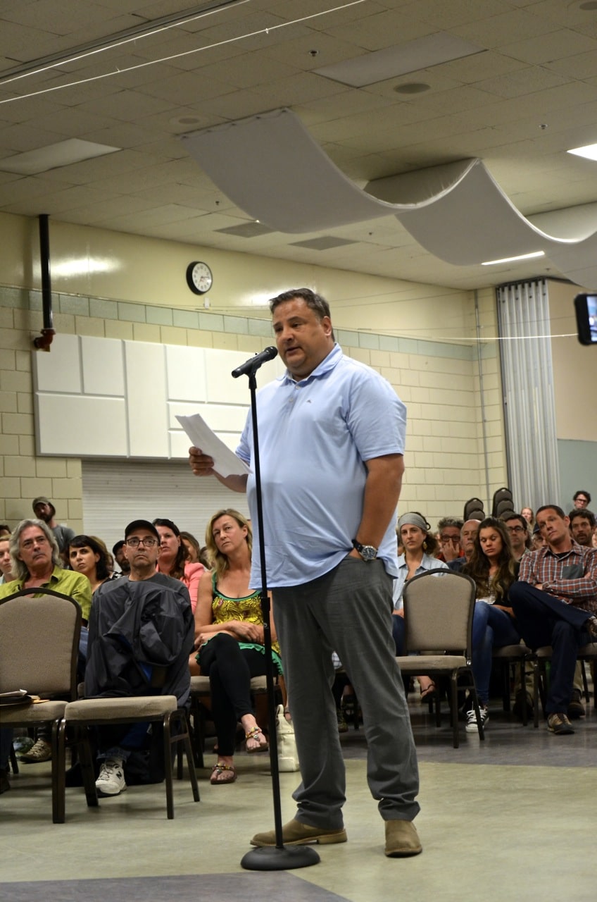 Revelstoke Mountain Resort CEO and president of its parent company Northland Properties Corp, Tom Gaglardi, speaks at the public hearing on the rezoning application for Camozzi Bench. Photo: Emily Kemp/Revelstoke Mountain Resort