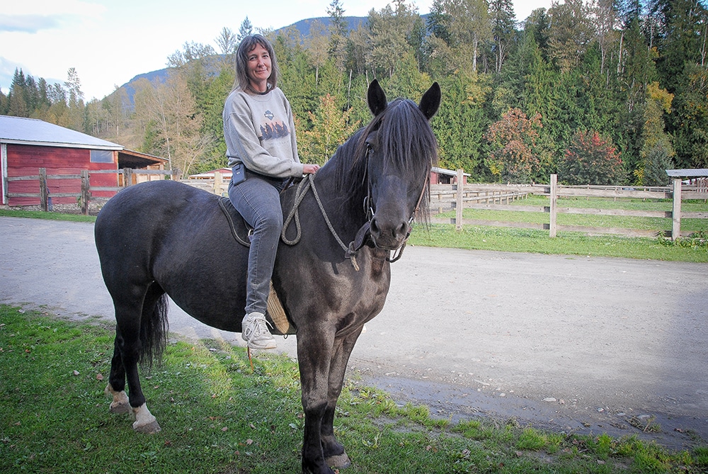 Kim Rienks with her horse. Photo: Imogen Whale
